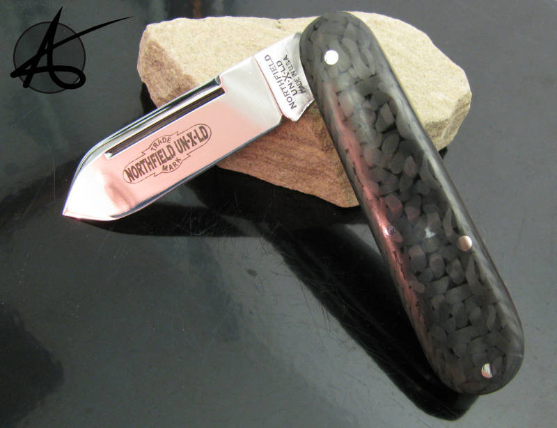 Great Eastern #25 "Ultralight" - Titanium frame, Carbon Fiber and Red G10 scales, Filework