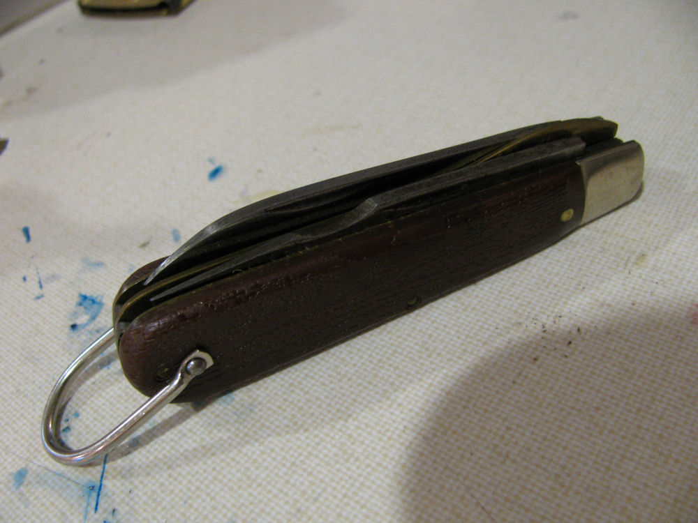 Kutmaster Electrician's knife - before all the work was done, after soaking in oil for a few days to clean it a bit. 